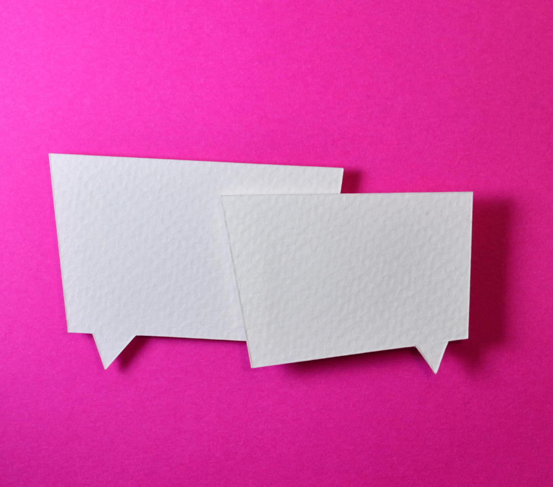 Two white thought bubbles against a pink background.